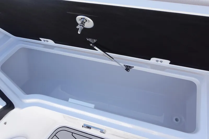 Slide: The Image of 2025 Sea Fox 328 Commander boat with sleek seating and modern design in a marina setting. - 28