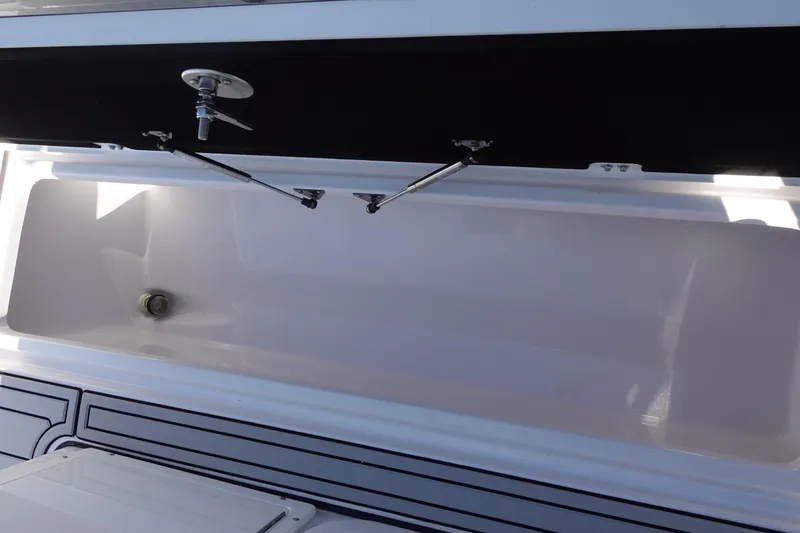 Slide: The Image of 2025 Sea Fox 328 Commander boat interior with seating and dual outboard motors. - 37