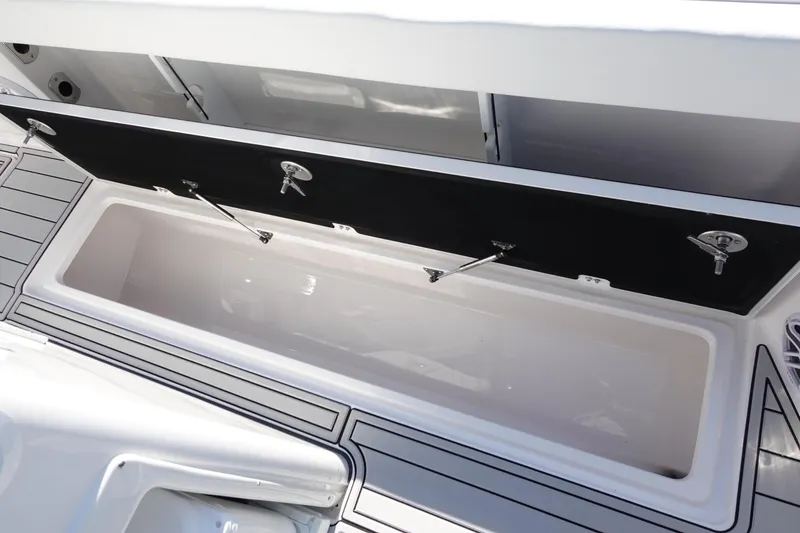 Slide: The Image of Twin black outboard engines on a 2025 Sea Fox 328 Commander boat. - 38