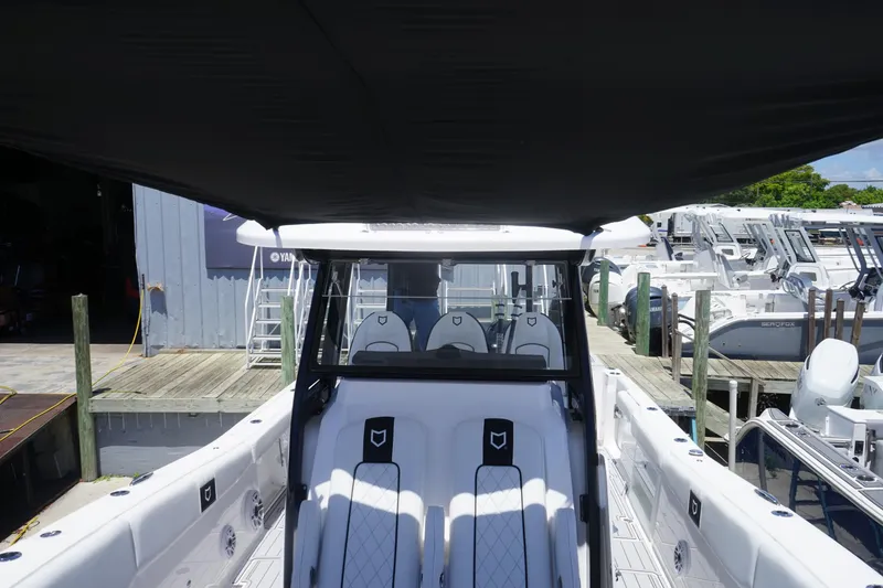 Slide: The Image of Sea Fox 328 Commander 2025 at The Boat Kings dealership exterior. - 45