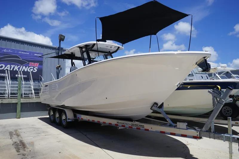 Slide: The Image of Garmin marine equipment on 2025 Sea Fox 328 Commander boat, close-up view. - 52