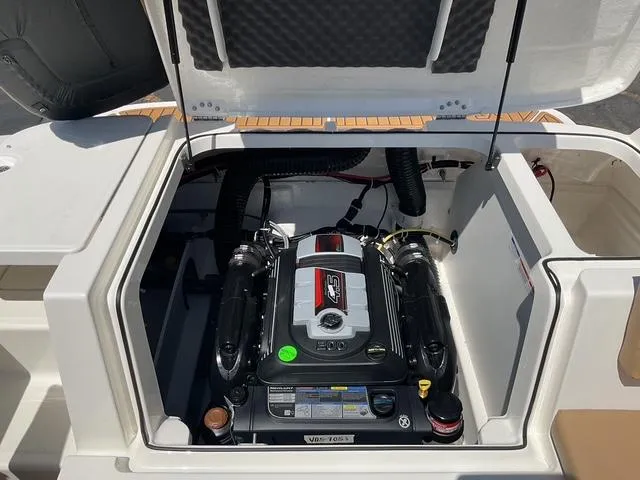 Slide: The Image of 2025 Bayliner VR5 Bowrider I/O engine compartment, showcasing powerful inboard motor. - 18