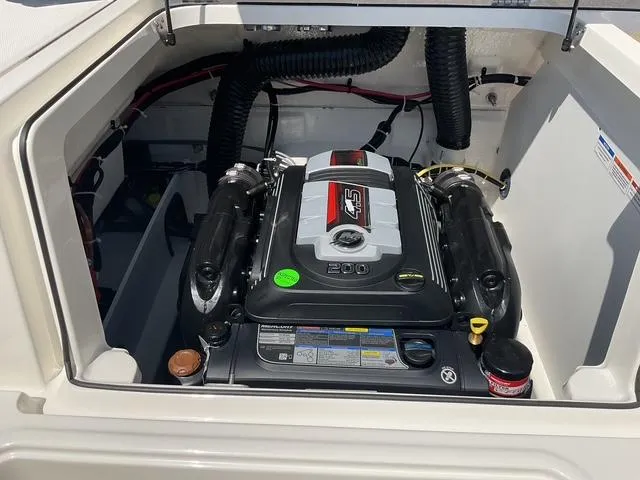 Slide: The Image of 2025 Bayliner VR5 Bowrider I/O engine compartment showcasing powerful inboard motor. - 20