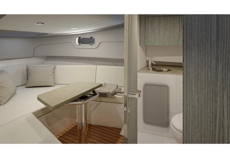 Slide: The Image of Luxurious interior of 2025 Oryx 32 FX yacht with seating and compact bathroom. - 8
