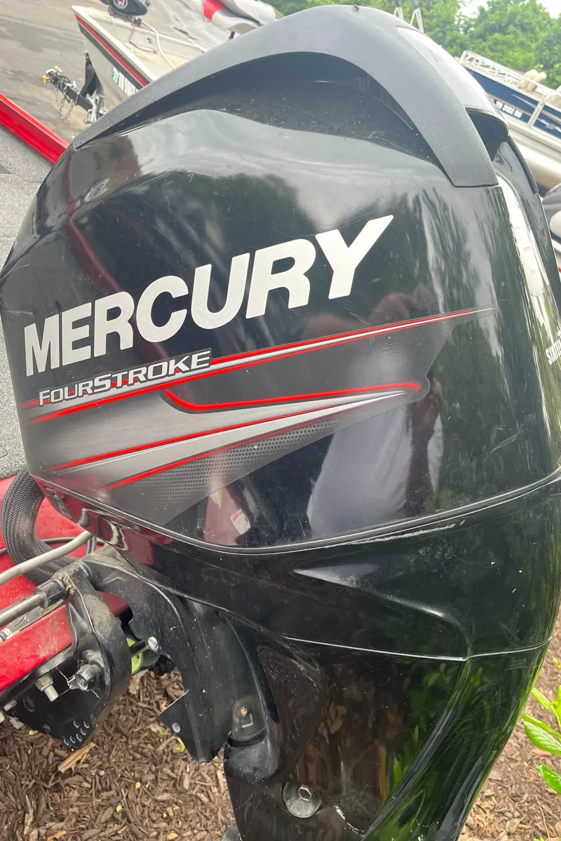 Slide: The Image of Mercury FourStroke engine on a 2017 Lowe Stinger 175 boat. - 2