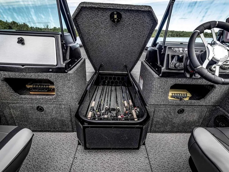 Slide: The Image of 2026 Lund 1875 Impact XS boat interior with rod storage compartment open. - 14