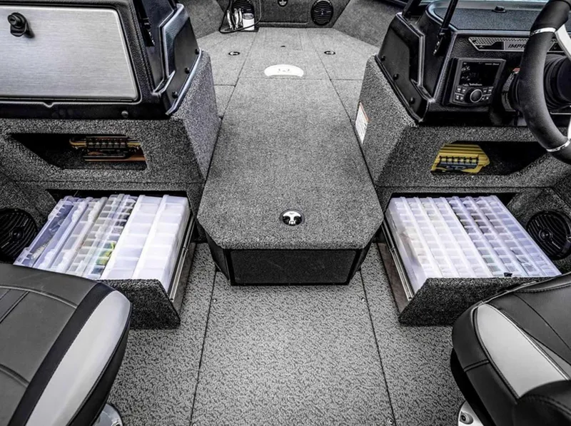 Slide: The Image of Interior of 2026 Lund 1875 Impact XS boat with organized storage compartments. - 15