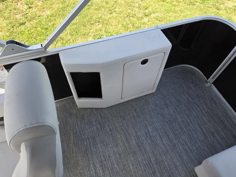Slide: The Image of Interior view of 2025 Godfrey Sweetwater 2086 C pontoon boat with seating and storage. - 12