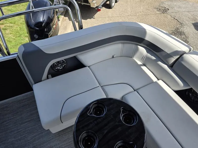 Slide: The Image of Luxurious seating on 2025 Godfrey Sweetwater 2086 C pontoon boat with cup holders. - 13