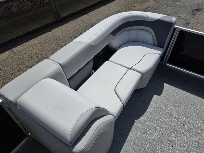 Slide: The Image of Luxurious seating on 2025 Godfrey Sweetwater 2086 C pontoon boat, featuring sleek gray upholstery. - 8