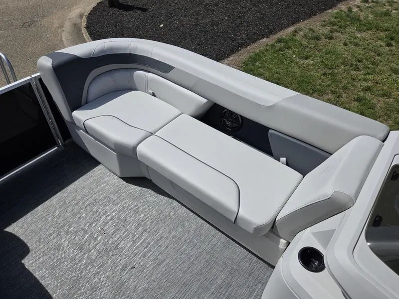 Slide: The Image of Luxurious seating on 2025 Godfrey Sweetwater 2086 C pontoon boat, featuring sleek gray upholstery. - 9