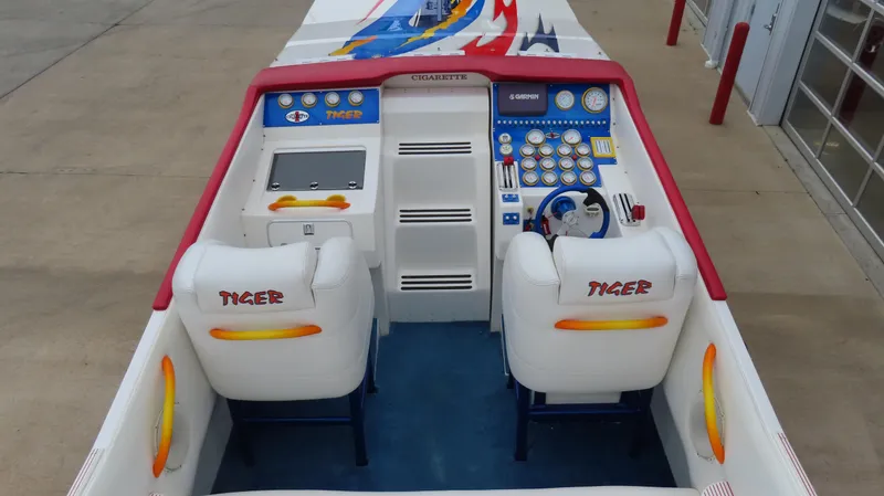 Slide: The Image of 2004 Cigarette 42 Tiger boat cockpit with dual seats and control panel. - 3