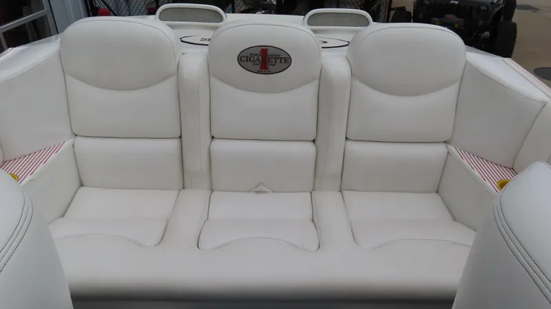 Slide: The Image of 2004 Cigarette 42 Tiger boat interior with white leather seating. - 9