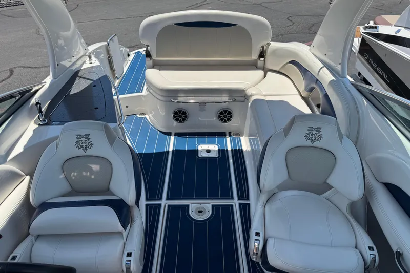 Slide: The Image of Interior of 2012 Chaparral 267 SSX boat with blue and white seating. - 4