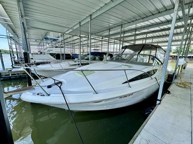 The Image of 2001 Bayliner 2855 Ciera boat docked in a covered marina. - 0
