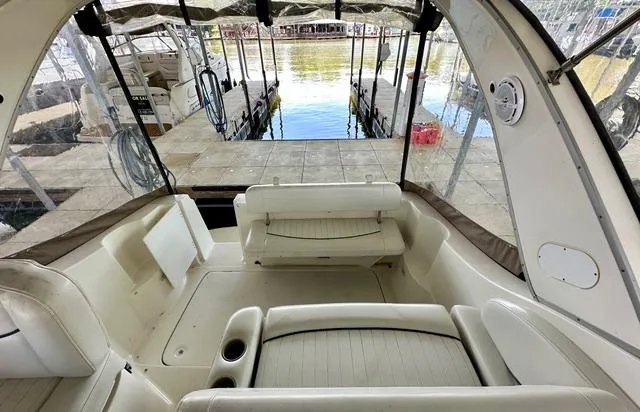Slide: The Image of 2001 Bayliner 2855 Ciera boat interior with seating, docked at marina. - 10