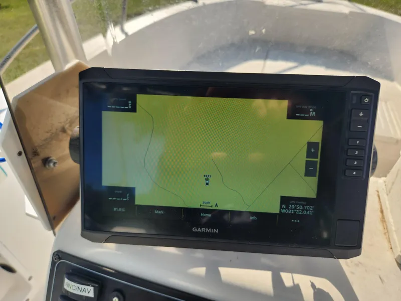 Slide: The Image of Garmin navigation system on 2005 Key Largo 210 CC boat dashboard. - 26