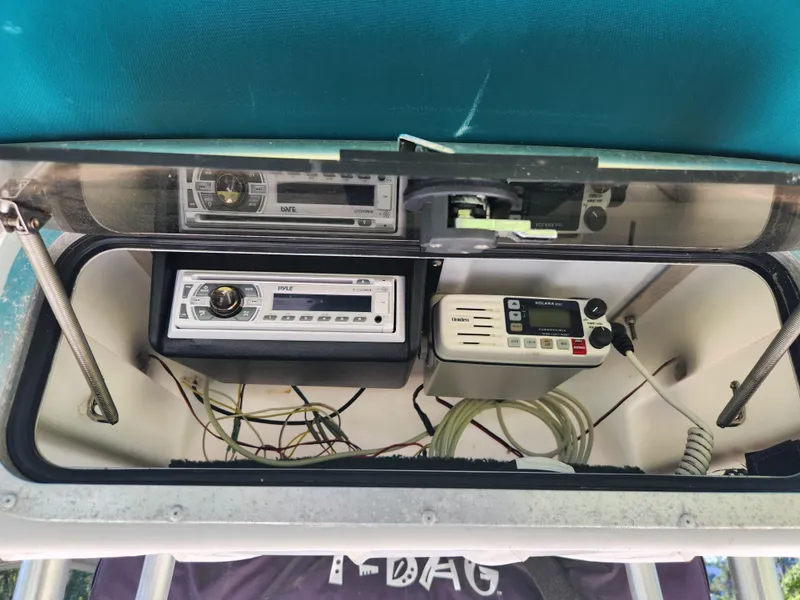 Slide: The Image of Boat electronics panel with radio and wiring on a 2005 Key Largo 210 CC. - 28