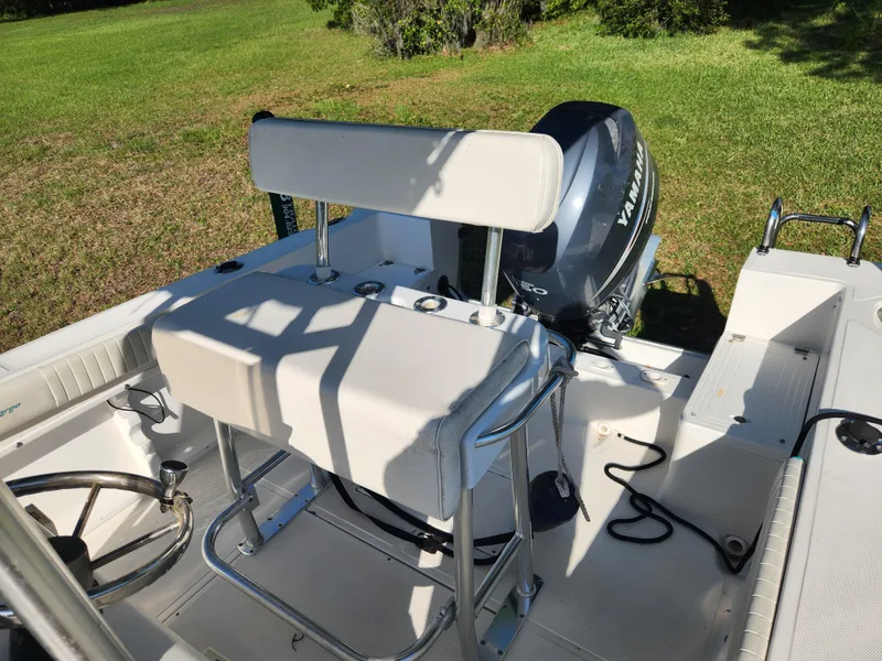 Slide: The Image of 2005 Key Largo 210 CC boat interior with Yamaha outboard motor. - 29