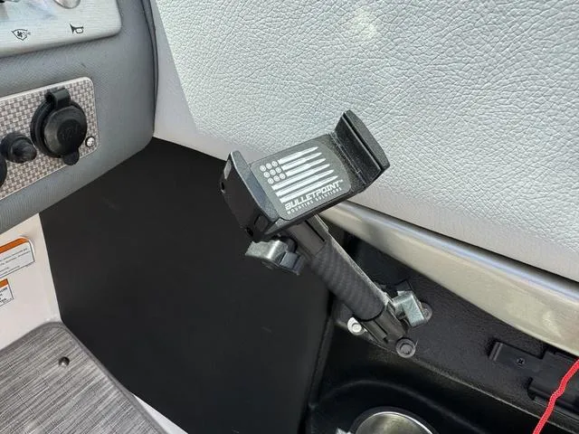 Slide: The Image of Phone mount in a 2014 Regal 2300 boat interior. - 15