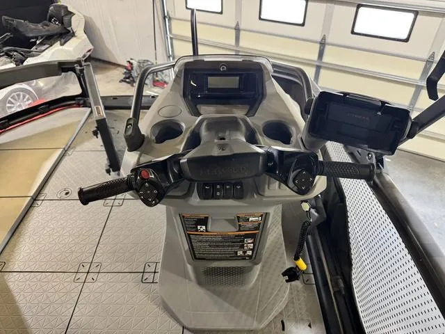 Slide: The Image of 2023 Sea-Doo Switch® Sport Compact-170 hp dashboard and controls in a garage setting. - 14