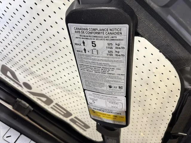 Slide: The Image of Canadian compliance notice on 2023 Sea-Doo Switch® Sport Compact-170 hp, showing weight limits. - 16