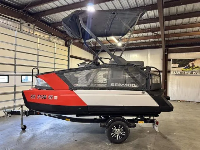 Slide: The Image of 2023 Sea-Doo Switch® Sport Compact-170 hp on trailer in indoor storage. - 5
