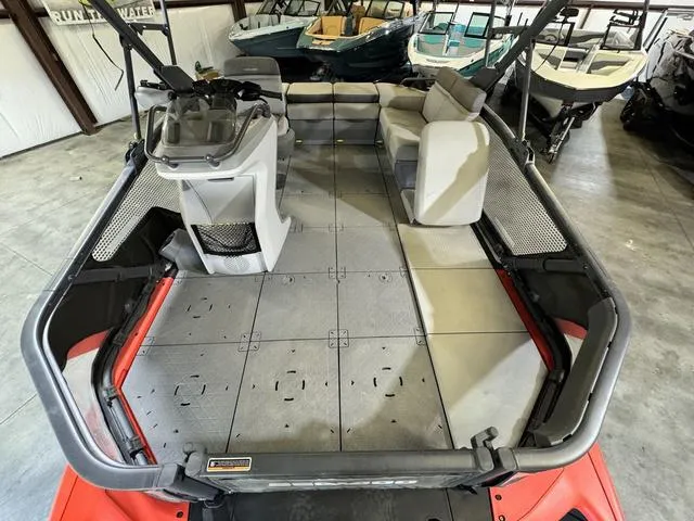 Slide: The Image of 2023 Sea-Doo Switch® Sport Compact-170 hp boat interior with seating and control console. - 9