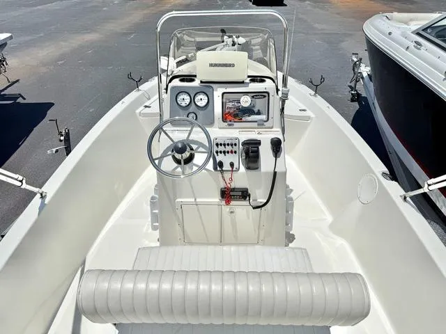 Slide: The Image of 2012 NAUTIC STAR 1810 CC boat console with steering wheel and gauges. - 4