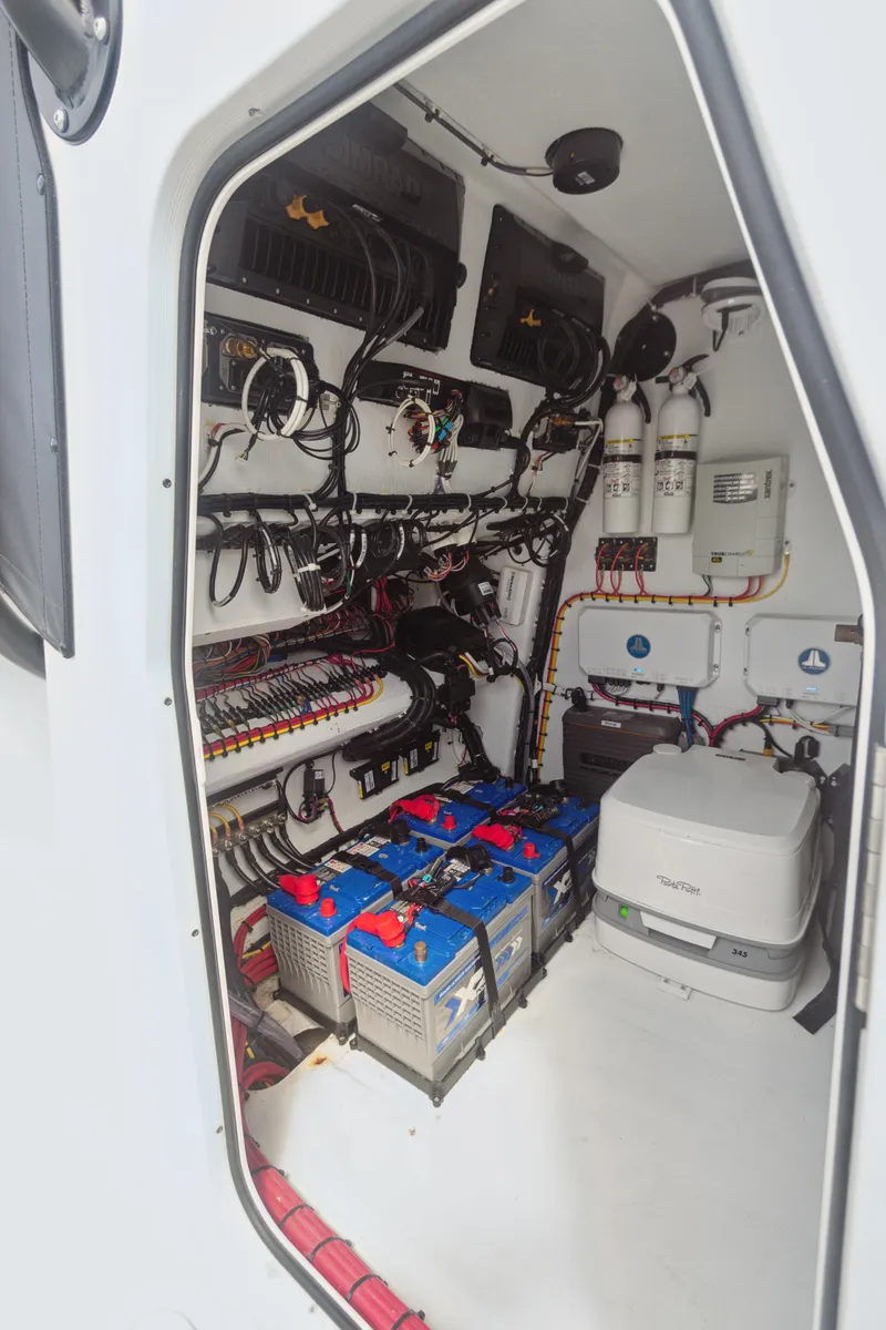Slide: The Image of Interior of a 2022 Freeman 34VH boat showing electrical systems and batteries. - 3