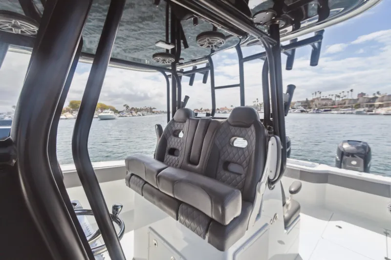 Slide: The Image of Luxurious interior of 2022 Freeman 34VH boat with plush seating and scenic water view. - 5