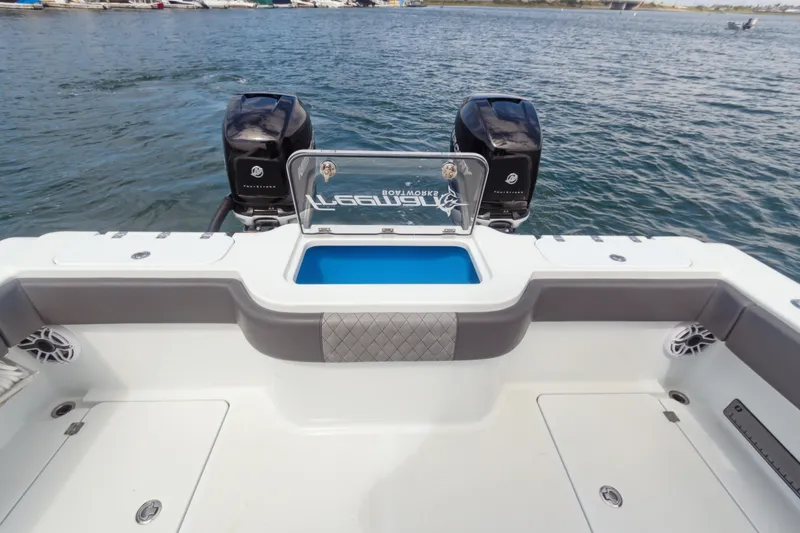 Slide: The Image of Freeman 34VH 2022 boat with dual engines and spacious deck on the water. - 9