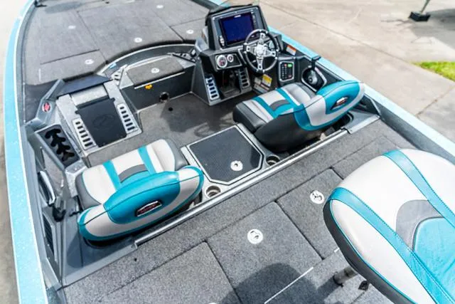 Slide: The Image of 2020 Ranger 521L boat interior with modern dashboard and seating. - 5