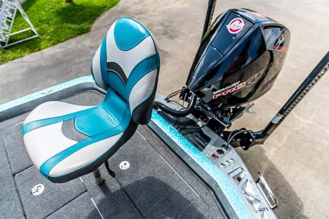 Slide: The Image of 2020 Ranger 521L boat seat and Mercury engine on deck. - 6