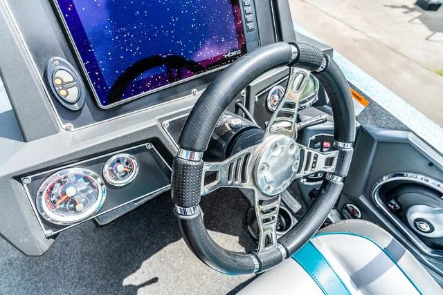 Slide: The Image of Steering wheel and dashboard of 2020 Ranger 521L boat with digital display and gauges. - 8
