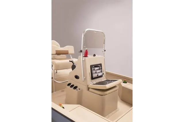 Slide: The Image of 2023 G3 BAY 18T GX boat interior with fishing gear and camo seating. - 8