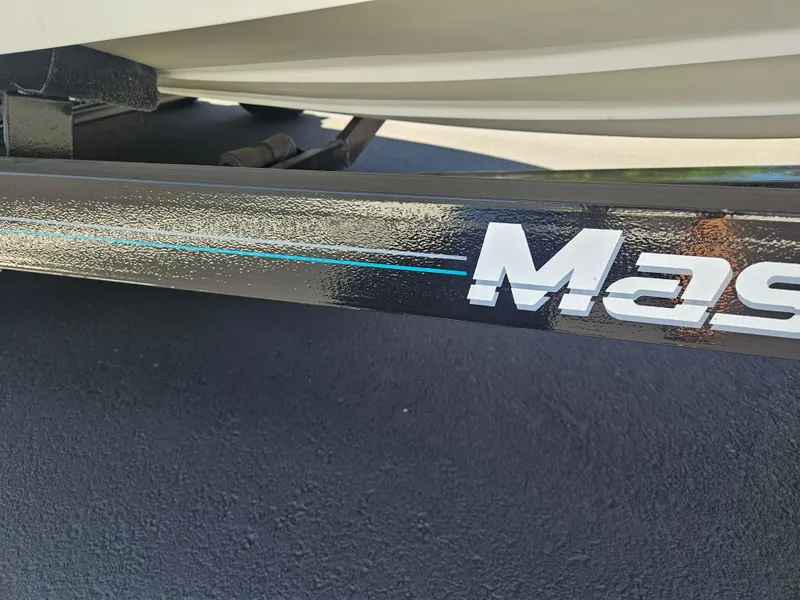 Slide: The Image of 1992 MasterCraft Prostar 205 boat trailer with logo detail. - 15