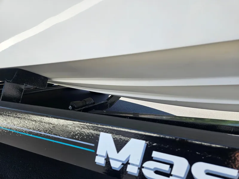Slide: The Image of 1992 MasterCraft Prostar 205 boat on trailer, close-up view. - 17