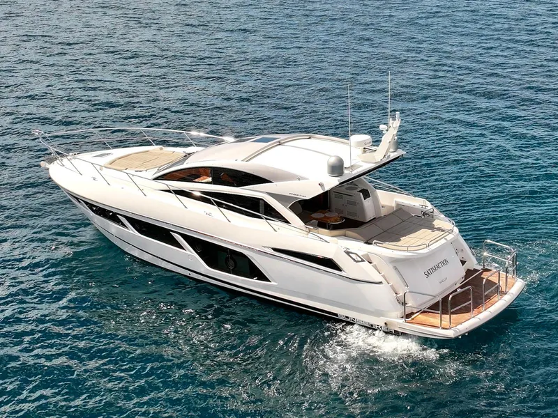 The Image of 2017 Sunseeker Predator 57 yacht cruising on clear blue water. - 1