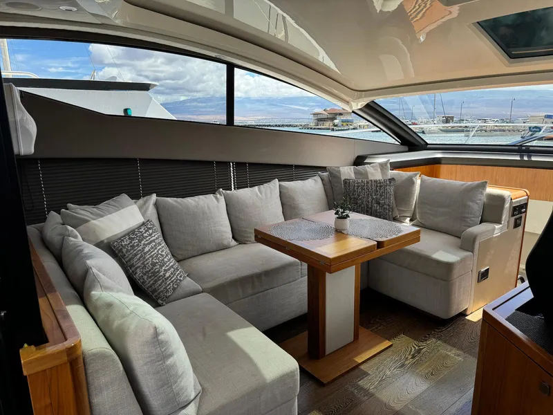 Slide: The Image of Luxurious Sunseeker Predator 57 yacht interior with elegant seating and table, 2017 model. - 14