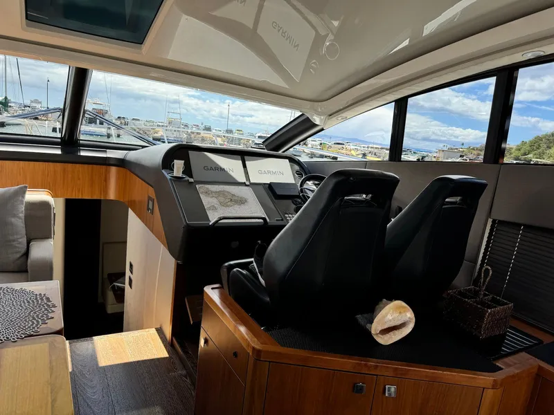 Slide: The Image of Interior of 2017 Sunseeker Predator 57 yacht with modern helm and seating. - 15