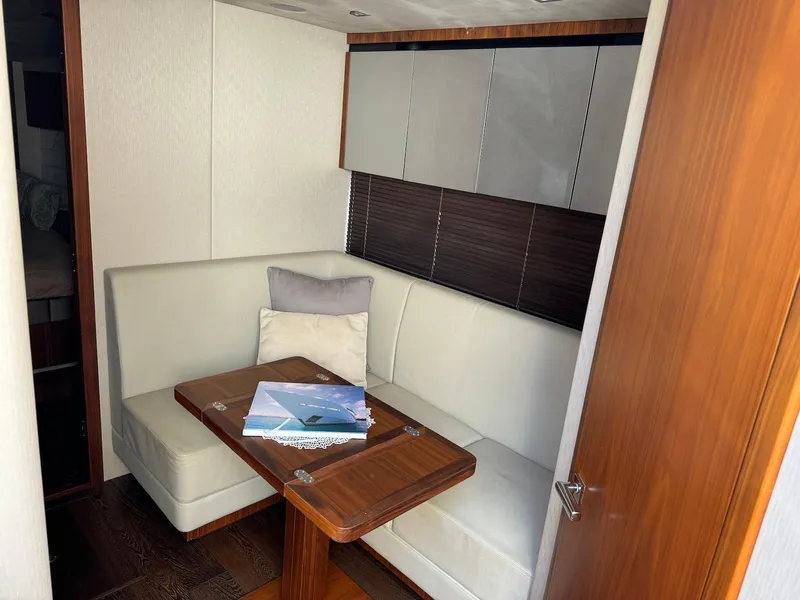 Slide: The Image of Luxurious interior of 2017 Sunseeker Predator 57 yacht with cozy seating area. - 19