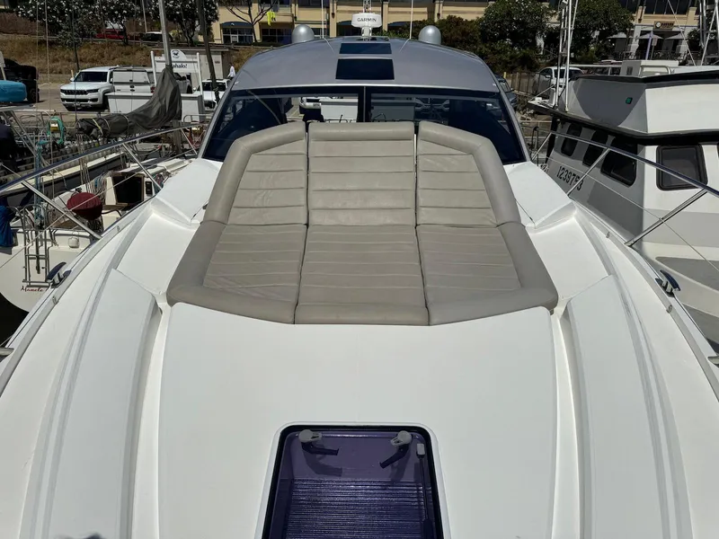 Slide: The Image of Sunseeker Predator 57 yacht, 2017 model, featuring a spacious sunbed on the deck. - 24