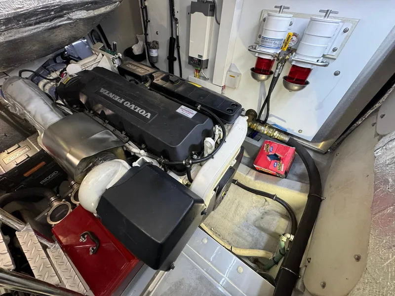 Slide: The Image of Engine room of 2017 Sunseeker Predator 57 with Volvo Penta engine and fuel filters. - 26