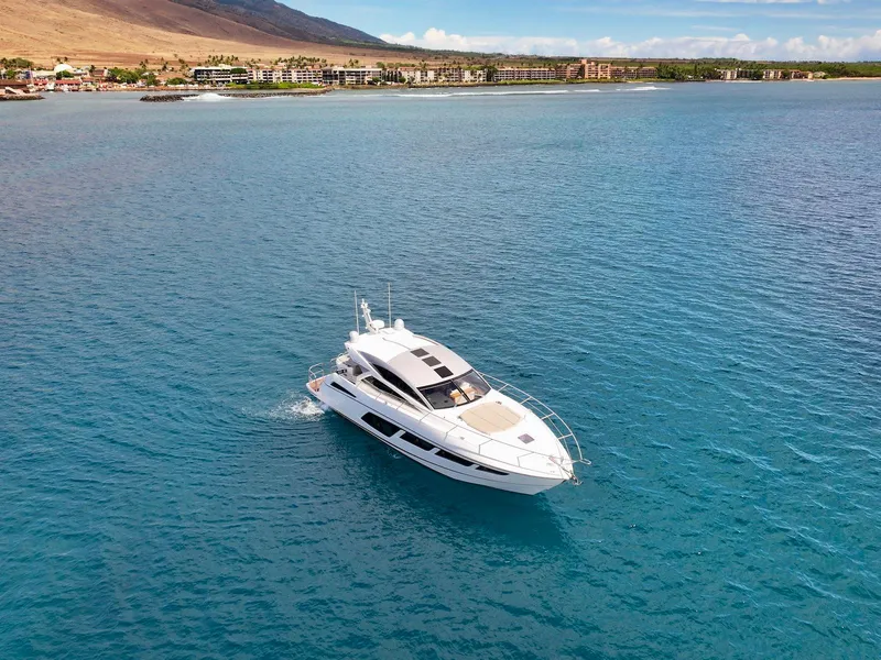 Slide: The Image of Sunseeker Predator 57 yacht cruising in clear blue waters, 2017 model. - 5