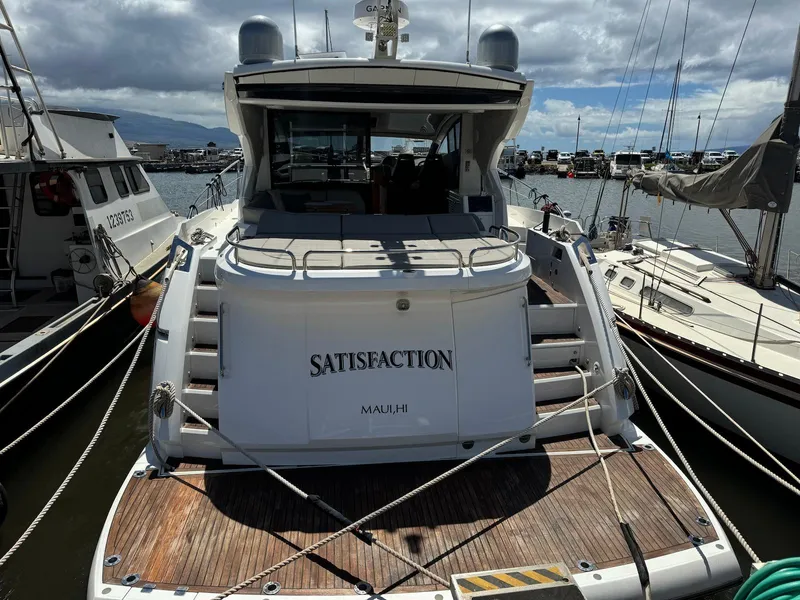 Slide: The Image of 2017 Sunseeker Predator 57 yacht docked at marina, rear view. - 9