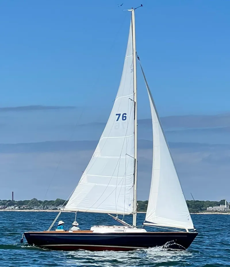 Slide: The Image of Alerion Express 28 sailboat from 1997 sailing on a clear day. - 10