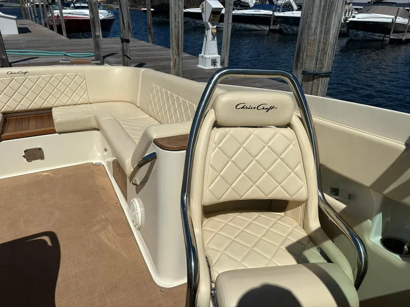 Slide: The Image of Luxurious 2016 Chris-Craft Launch 28 boat interior with cream leather seating and elegant design. - 23