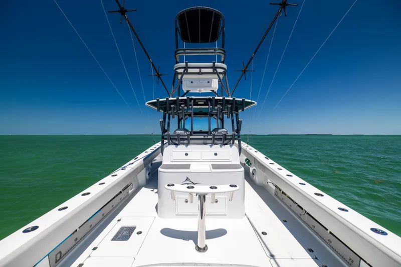 Slide: The Image of Freeman 42 LR 2021 boat on open water under clear blue sky. - 29