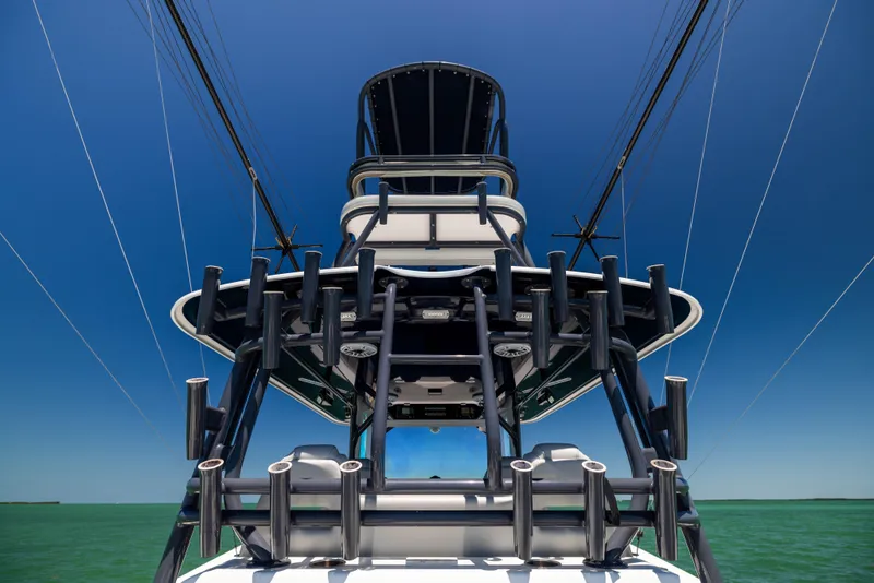Slide: The Image of 2021 Freeman 42 LR boat tower against clear blue sky and ocean backdrop. - 49